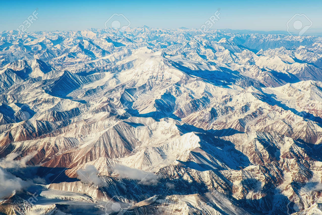 Hiker overlooking the ancient Inca city of Machu Picchu in Peru